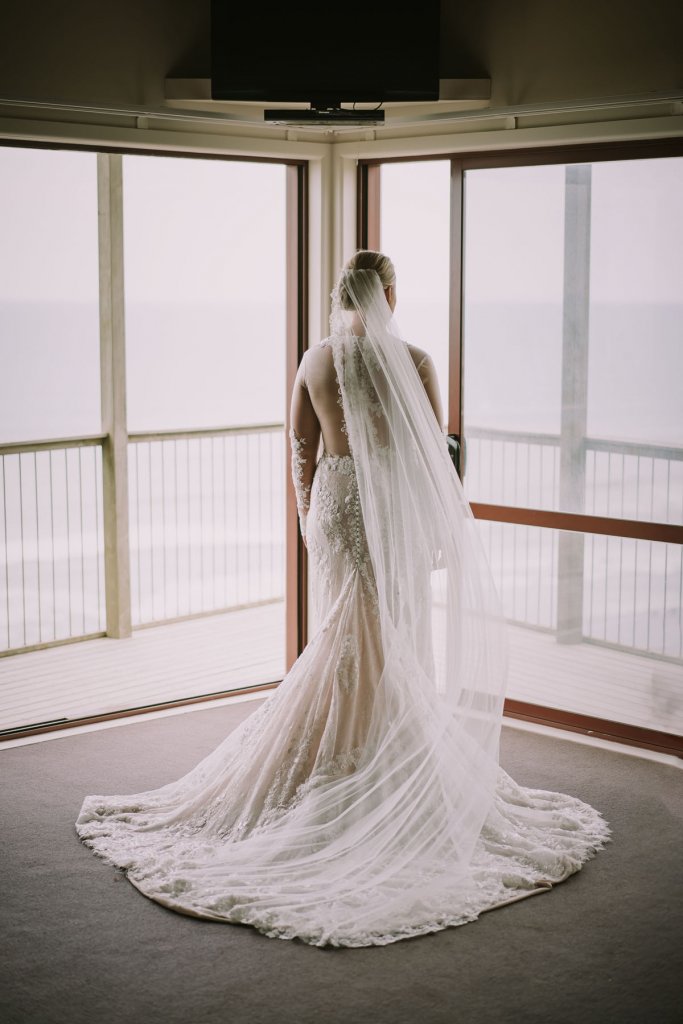 Real Bride Jamielle wearing her Custom Harriett Falvey Wedding Dress and Veil Made in New Zealand